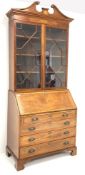 George III mahogany bureau bookcase, swan neck pediment with paterea inlay over astragal glazed door