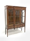 Edwardian mahogany break front display cabinet, satinwood crossbanded and boxwood and ebonised strin