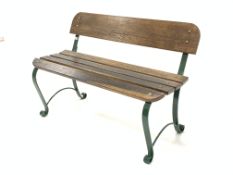 20th century garden bench with green powder coated scrolled wrought metal supports and slated oak se