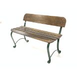 20th century garden bench with green powder coated scrolled wrought metal supports and slated oak se