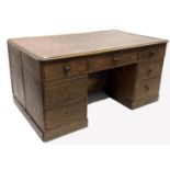 19th century oak estate twin pedestal desk, skivered top over one long drawer and two banks of three