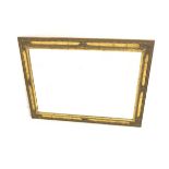 Ornate gilt framed mirror, with shell and floral moulding enclosing bevelled plate, 77cm x 107cm