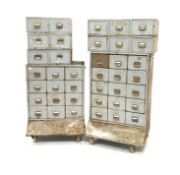 Industrial drawers - One bank of 15 stamped sheet metal industrial drawers, raised on large castors,