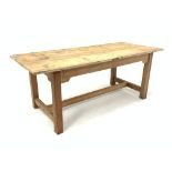 19th century French pine refectory style dining table, the associated top over shaped apron raised o