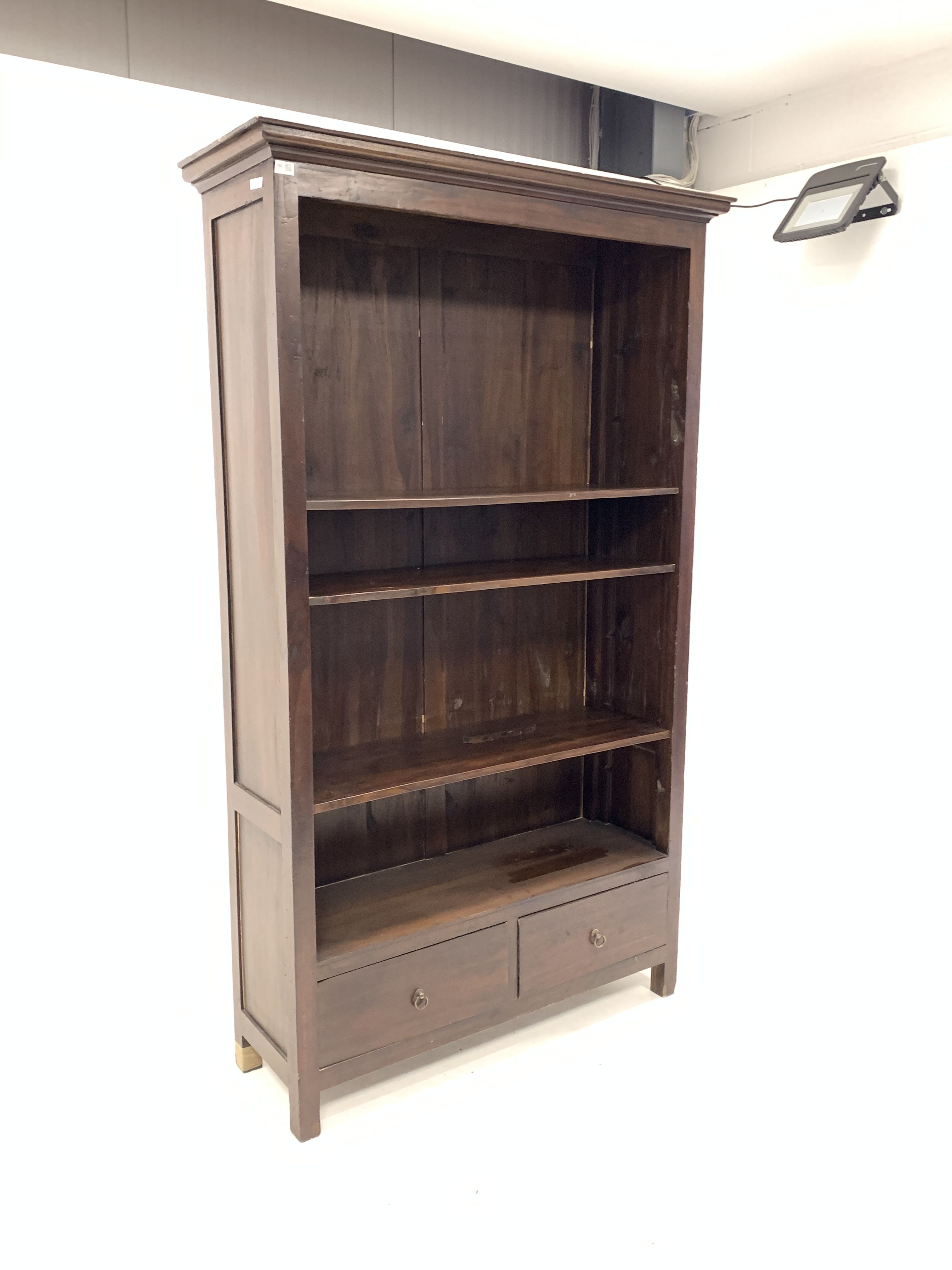 20th century stained hard wood open bookcase, with three adjustable shelves over two drawers, raised - Image 2 of 4