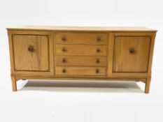 Vintage elm dresser, with a bank of four drawers flanked by two panelled cupboards, raised on square