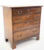 George III cross banded mahogany chest, fitted with four long graduated drawers raised on shaped bra