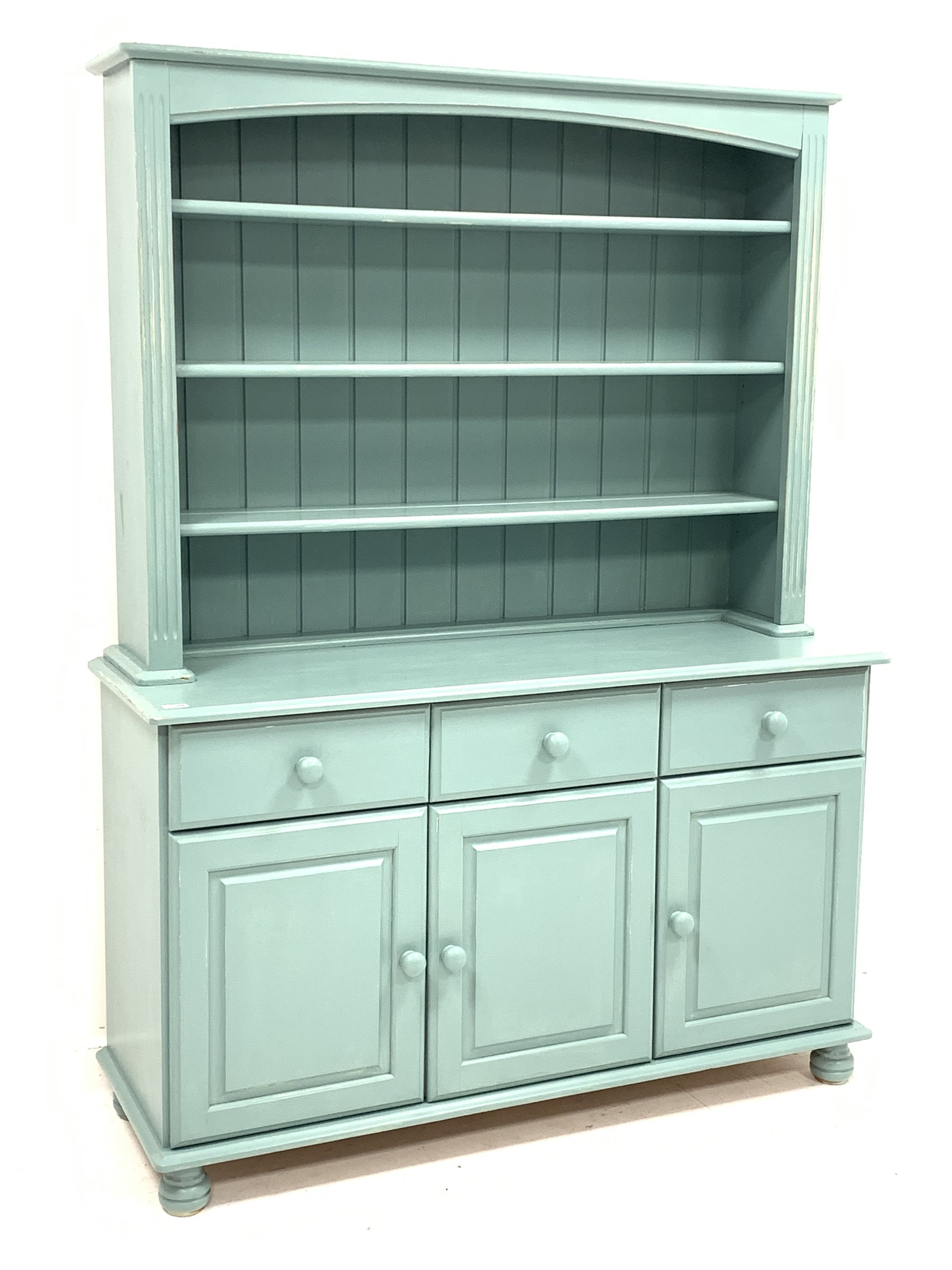 Turquoise blue painted wood kitchen dresser, three heights plate rack above three drawers and three