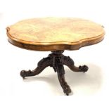 Victorian burr walnut loo table, the well figured quarter sawn veneered serpentine top raised on tur