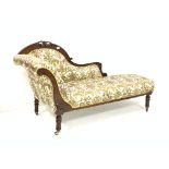 Late Victorian walnut chaise longue, with scroll ends and incised decoration, and carving to crest r