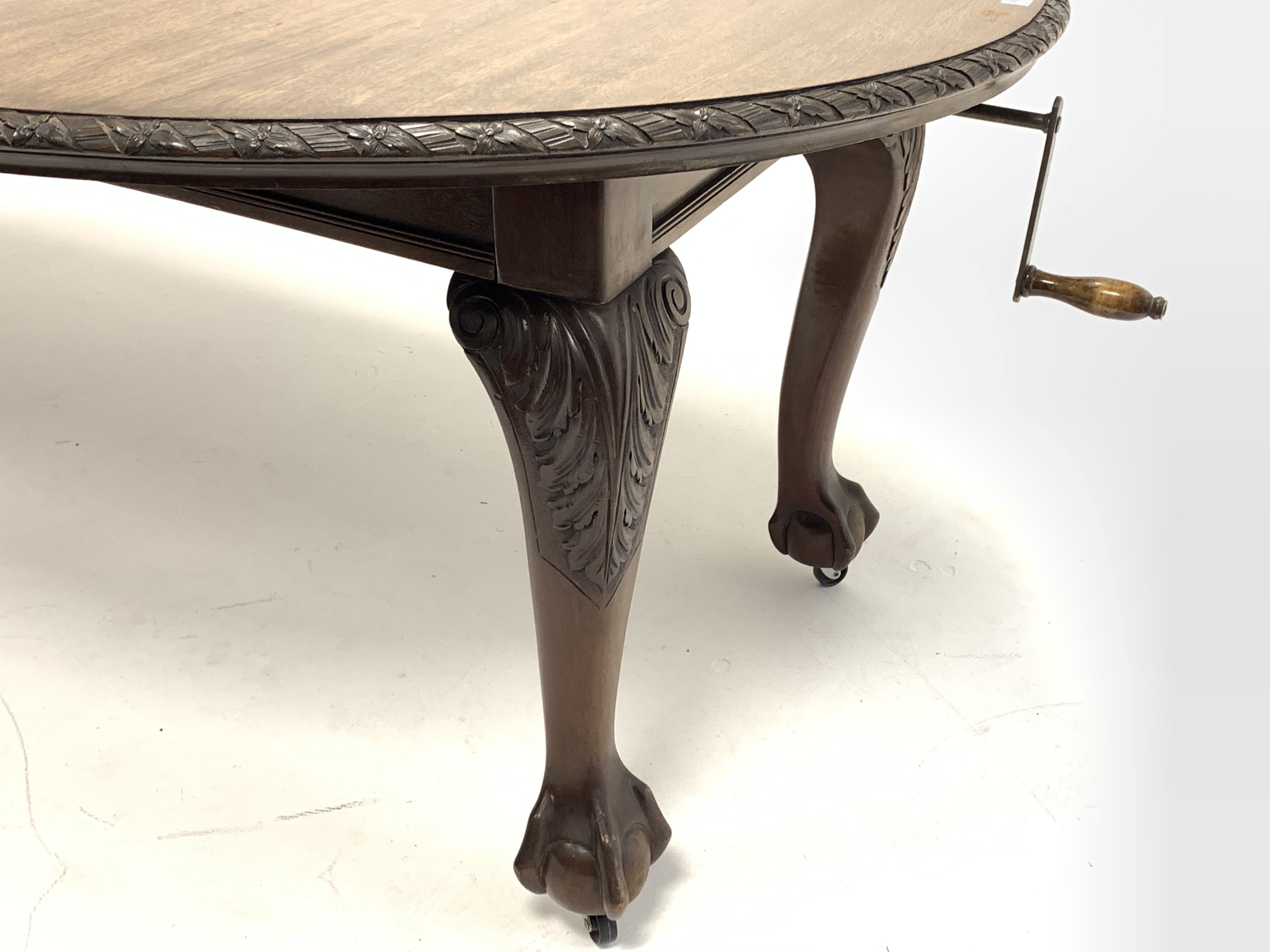 Early 20th century mahogany extending dining table, the oval top with floral edging over acanthus ca - Image 4 of 5