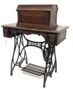 Vintage Jones treadle sewing machine, walnut top with two drawers raised on cast metal base, W86cm