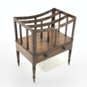 George III mahogany Canterbury with four divisions and single drawer, on turned supports with brass