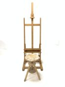 Pine artists adjustable easel, (H172cm, W56cm) together with a pine circular rise and fall stool, (D