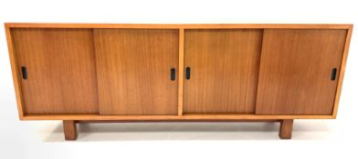 Mid 20th century retro teak Vintage sideboard in the style of Robin Day, with four sliding doors enc