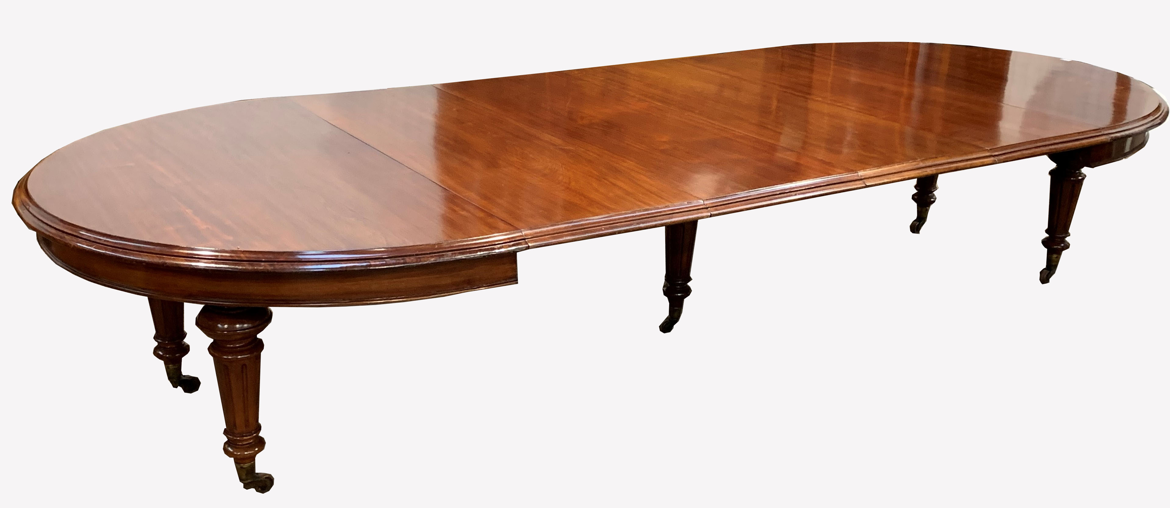 Large Victorian mahogany extending dining table, 'D' ended, with four additional leaves, raised on t