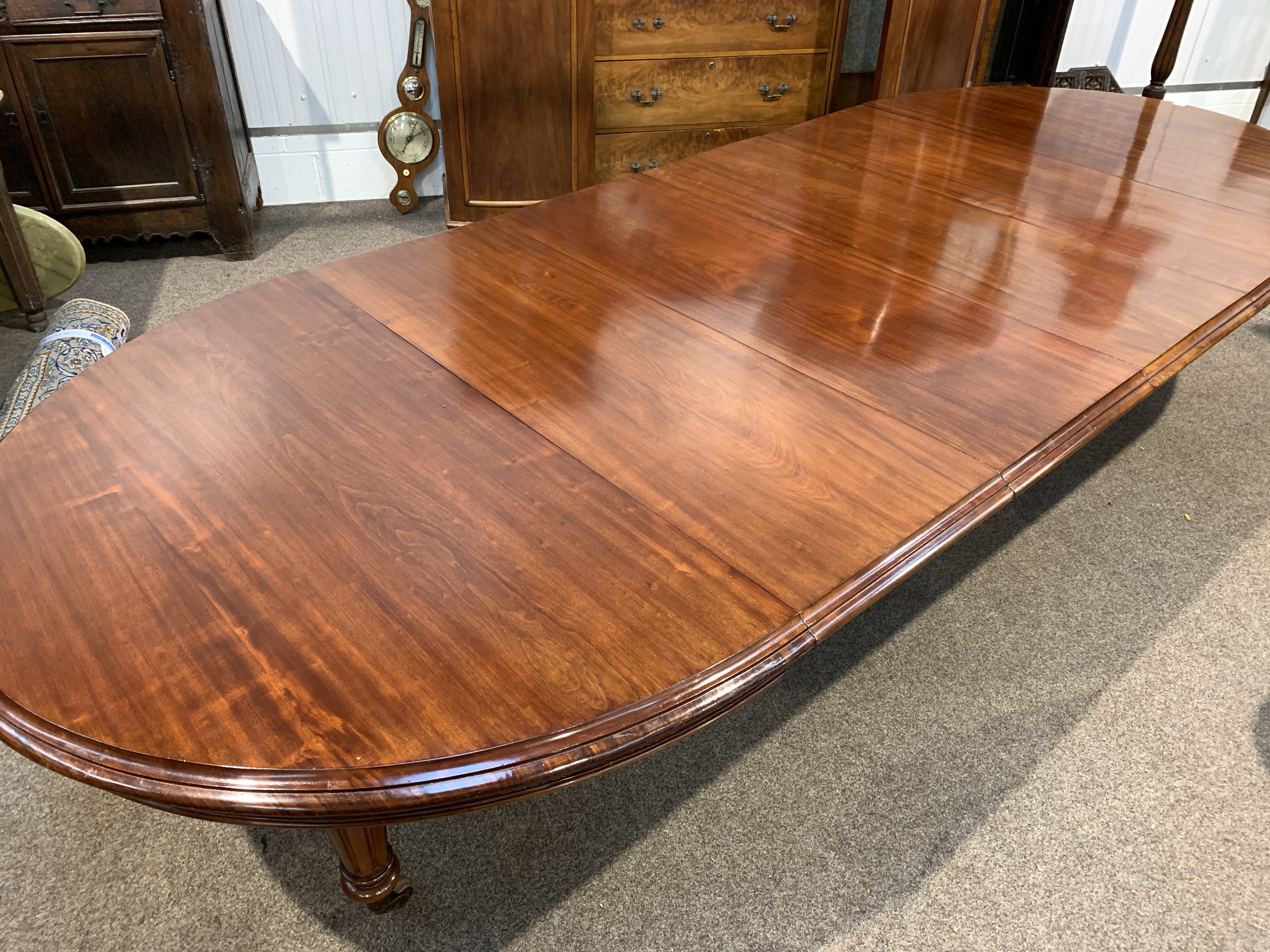 Large Victorian mahogany extending dining table, 'D' ended, with four additional leaves, raised on t - Image 7 of 10