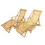 Pair light oak folding garden sun loungers with removable foot rests