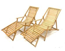 Pair light oak folding garden sun loungers with removable foot rests