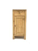 Stripped pine bedside cupboard, with marble top over one drawer and panelled cupboard enclosing a sh