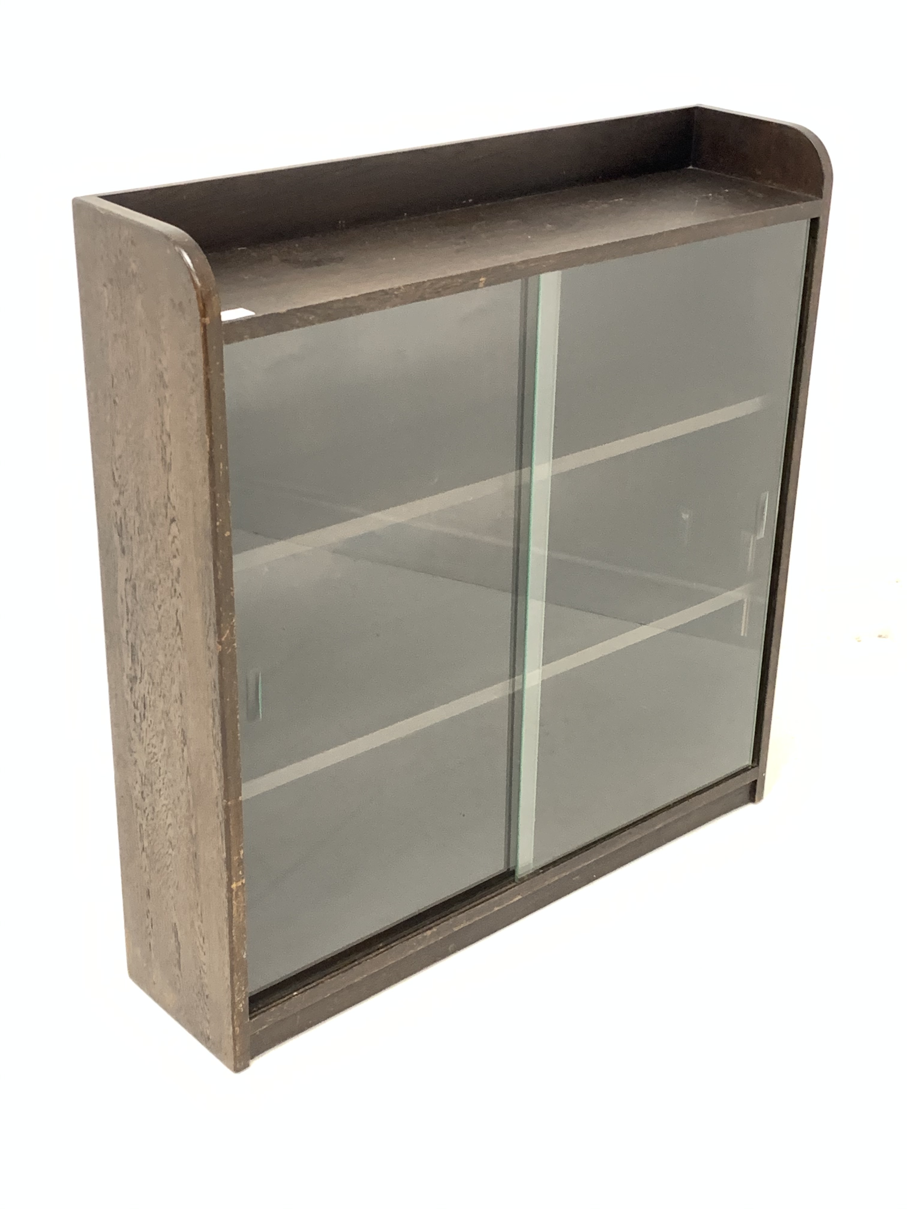Phoenix Galleries 'Criterion' stained oak bookcase, with sliding glass doors enclosing two shelves, - Image 2 of 4