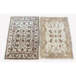 Chinese machined wool cream ground rug, decorated with interlaced foliate, (240cm x 165cm) and anoth