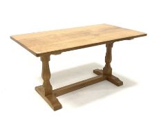 'Eagleman' Yorkshire oak 5� dining table, with adzed rectangular top raised on octagonal turned supp