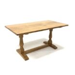 'Eagleman' Yorkshire oak 5� dining table, with adzed rectangular top raised on octagonal turned supp
