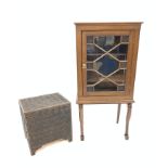 Early 20th century walnut display cabinet, with astragal glazed door enclosing two shelves, raised o