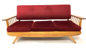 Mid 20th century retro elm and beech three seat sofa, with red velvet upholstered back and loose cus