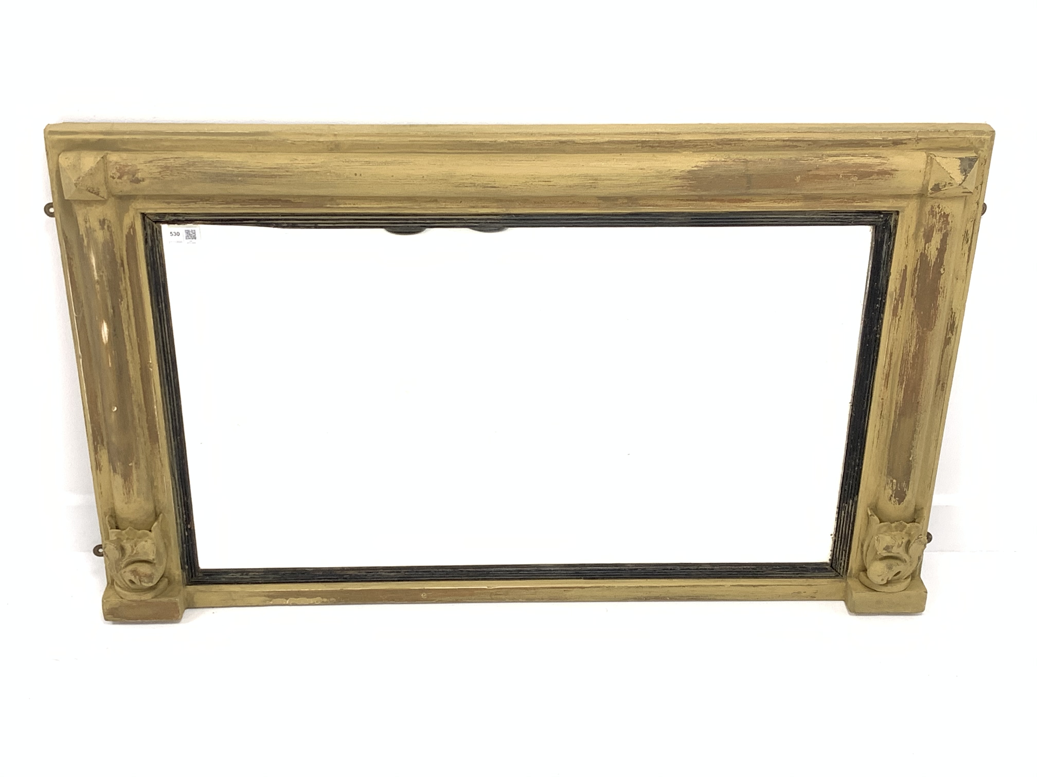 19th century over mantel mirror, the frame with half round pilasters terminating in carved acanthus