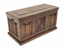 20th century pitch pine blanket box, panelled and carved with linen folds, wrought metal carry handl