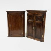 Georgian oak wall hanging corner cupboard, with dentil cornice over two panelled doors, (W79cm) and