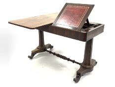 Mid 19th century rosewood library table, the revolving top moving to reveal stationery wells and slo