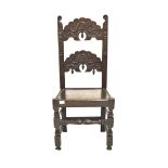 19th century oak Wainscot chair, with scroll carved back rails, panelled seat, raised on turned and