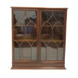 Georgian mahogany bookcase, with tracery glazed doors enclosing two adjustable shelves, W110cm, H122