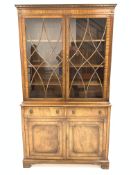 Georgian style mahogany bookcase cabinet, dentil cornice over astragal glazed doors enclosing three