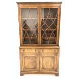 Georgian style mahogany bookcase cabinet, dentil cornice over astragal glazed doors enclosing three