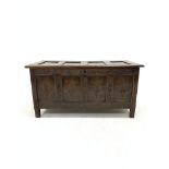 17th century oak coffer, four panelled lid revealing plain interior, scroll carved frieze and lozeng