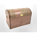 Early 20th century dome top trunk, with studded top, covered and bound in leather, interior lined wi