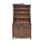 19th century mahogany bookcase on cupboard, three open shelves with beaded moulding, enclosed by scr