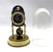 Kaiser Universal torsion clock , the astrological dial with a rotating moon phase ball, the `400-day