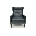 Barker and Stonehouse - contemporary leather upholstered wing back armchair, raised on square tapere