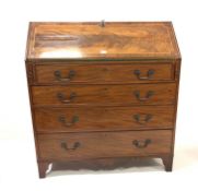 Georgian mahogany bureau, cross banded and string inlaid sloped front falling to reveal well fitted