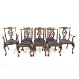 Set eight (6+2) Georgian style mahogany dining chairs, with floral carved cresting rail over pierced