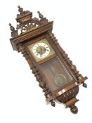 Early 20th century walnut and beech cased Vienna wall clock, with twin spring movement, H115cm