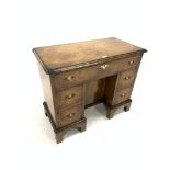 Early 20th century Georgian style burr walnut kneehole desk/dressing table, cross banded top over on