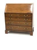 19th century mahogany bureau, the fall front revealing fitted interior with inlaid shell motif, over