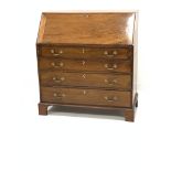 19th century mahogany bureau, the fall front revealing fitted interior with inlaid shell motif, over