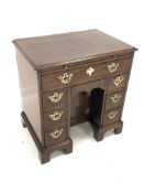 George III mahogany kneehole desk, brushing slide over one long drawer, one concealed drawer, one ar